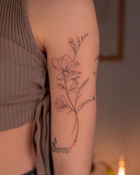 Magnolia Branch Tattoo on Arm