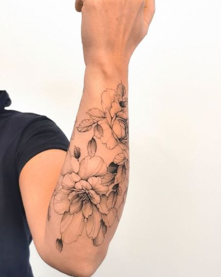 Magnolia Tattoo on The Forearm