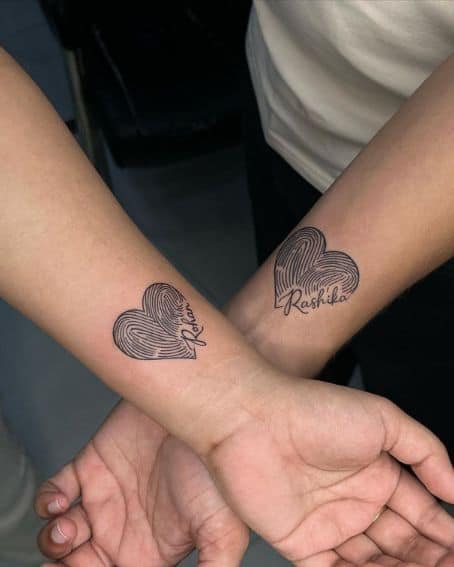 Matching Heart-Shaped Fingerprint Tattoo