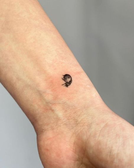 Minimalistic Ladybug Tattoo Design