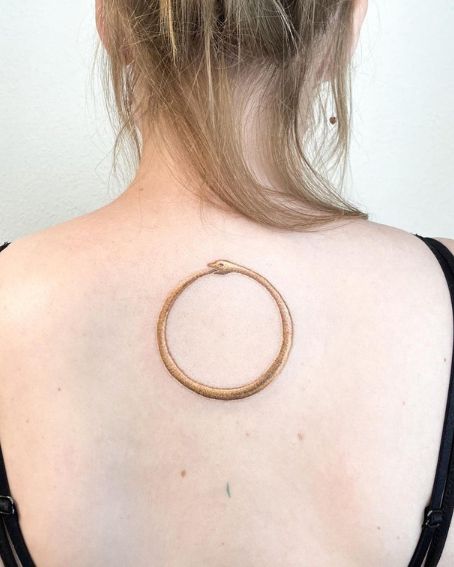Minimalistic Ouroboros Tattoo Design