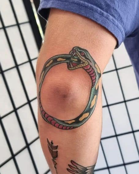 Ouroboros Tattoo Around The Elbow