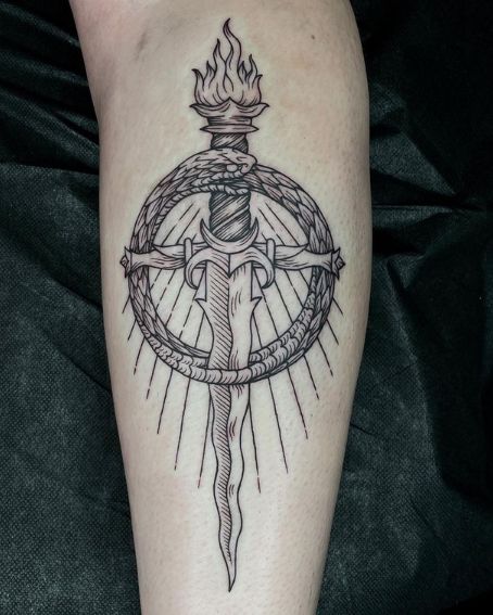 Ouroboros Tattoo Design with a Burning Dagger