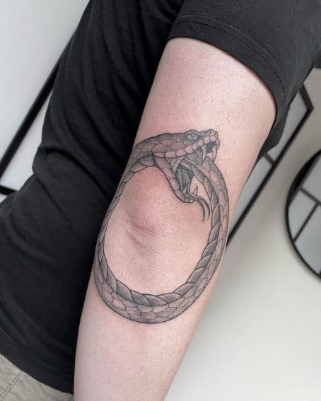 Ouroboros Tattoo on Elbow