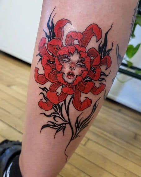 Red Chrysanthemum Tattoo with Face at Disc