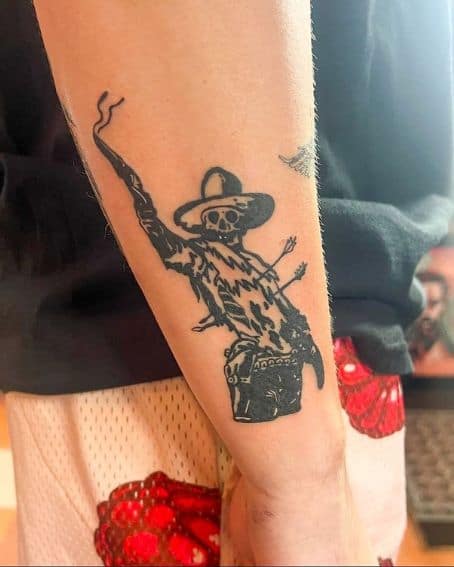 Skeleton Tattoo Wearing Hat