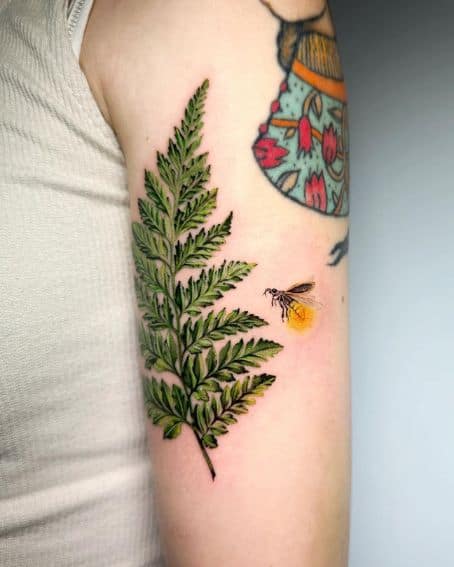 Small Firefly Tattoo with Large Leaf