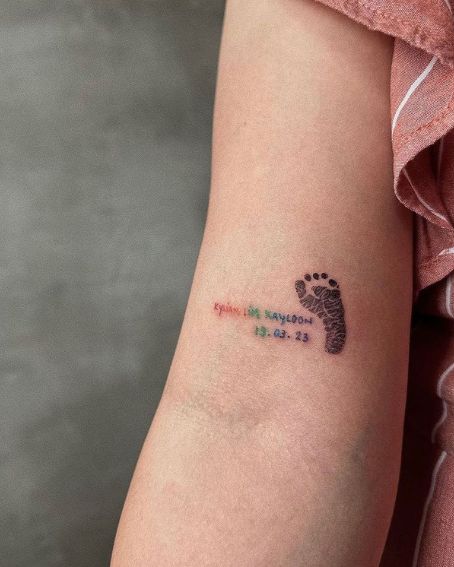 Small Footprint Tattoo on Arm