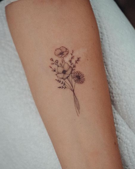 Small Forget-Me-Not Tattoo Design in Flower Bouquet