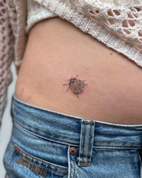Small Ladybug Tattoo on Waist