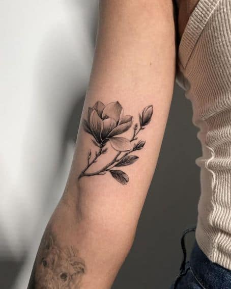 Small Magnolia Flower Tattoo on Elbow