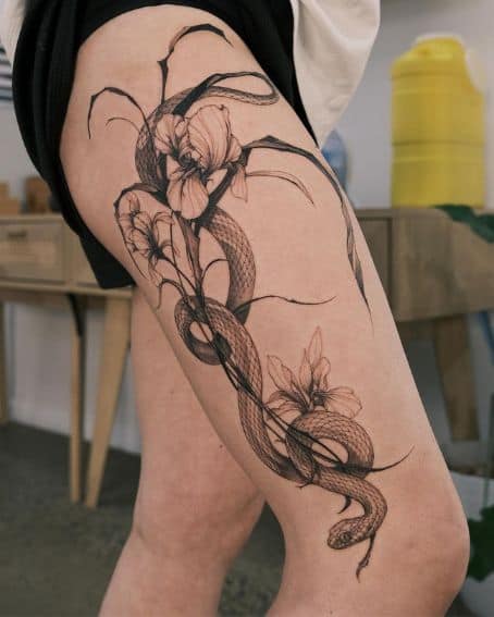 Snake and Iris Tattoo on Thigh