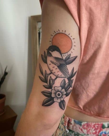 Sun and Chickadee Tattoo on Back Arm