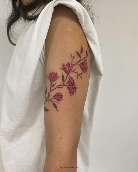 Sweet Magnolias Tattoo on Upper Arm