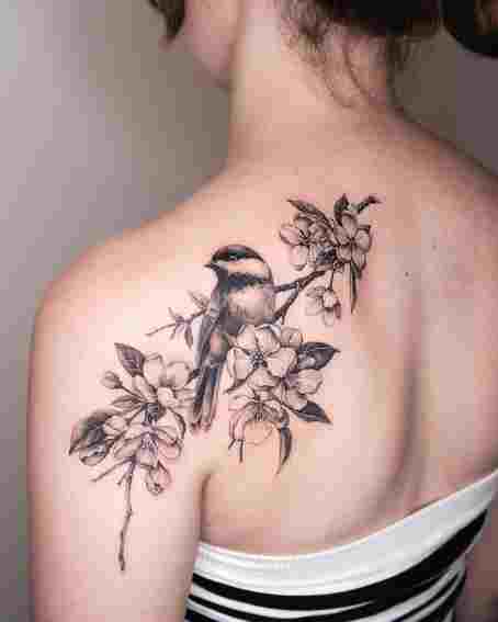 Tattoo of Chickadee Sitting on the Floral Stem