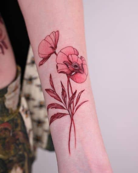 Tattoo of Red Poppies on the Elbow