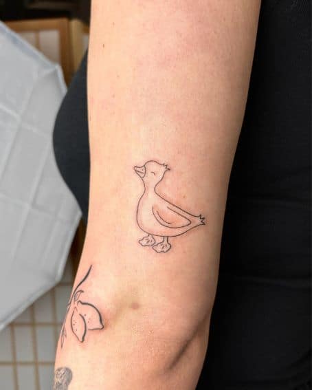 Tiny Fine-Line Duck Tattoo Design