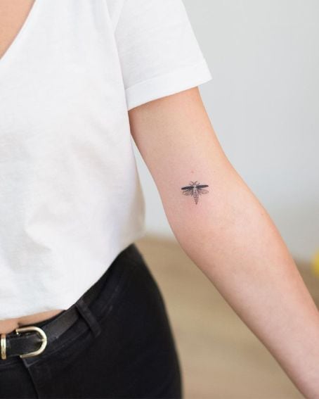 Tiny Firefly Tattoo Design on Arm