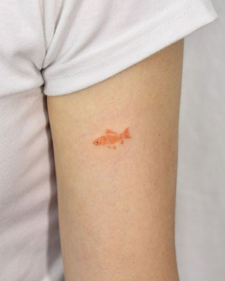 Tiny Goldfish Tattoo on Arm