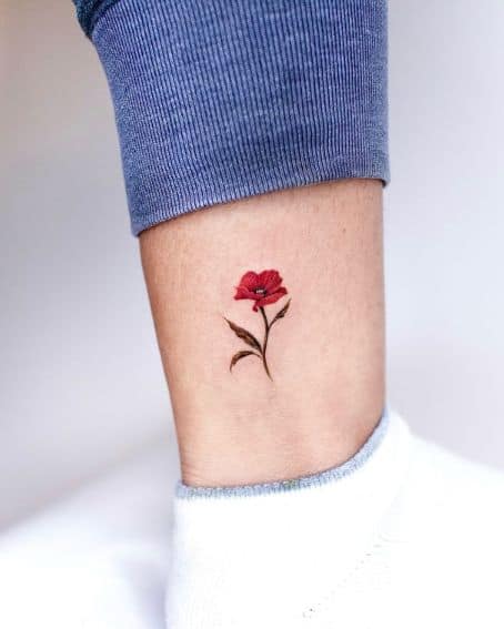 Tiny Poppy Flower Tattoo on Ankle