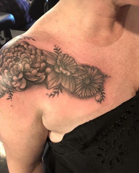 Trailing Flower Shoulder Tattoo Design