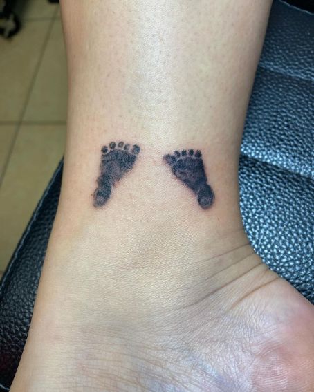 Two Little Footprint Tattoo Design