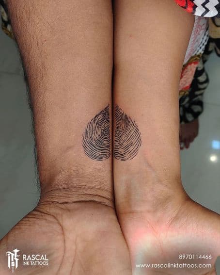 Two-Piece Heart Fingerprint Tattoo