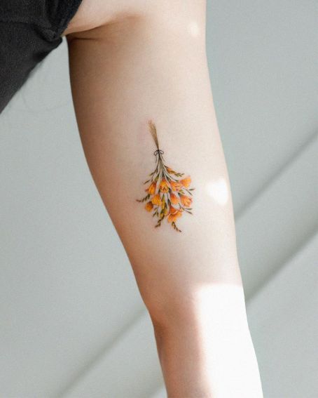Yellow Freesia Flowers Tattoo on Upper Arm